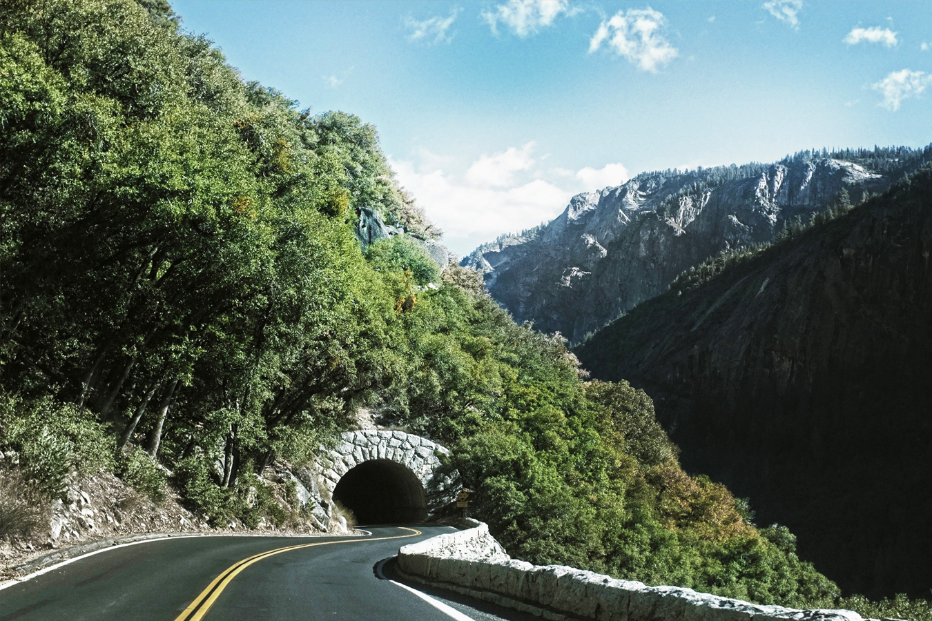 Image of a tunnel with mountains in the back