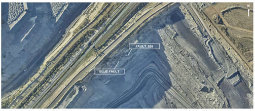 Plan view map of the case study slope with major fault traces annotated. Two dominant fault systems (Blue Fault, Fault 025) and the wedge geometry are clearly visible.
