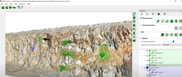 Figure 2. A view in ShapeMetriX, where you can interact with a planar discontinuity surface (shown in green here) and quickly determine the average orientation and size of that patch.